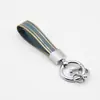 Llavero Popular Transfronterizo para Coche de TPU Colgante de Anillo de Llave de Aleación de Zinc Llavero con Borde Dorado de TPU Venta al Por Mayor de Fábrica