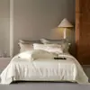 Juego de cuatro piezas de estilo de lujo ligero de alta gama, mezcla de Tencel y algodón con jacquard tejido grueso, líneas minimalistas italianas, funda de edredón, sábana y sábana bajera ajustable