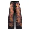 Calça jeans tie-dye com respingos de tinta estilo deserto para homens, calça larga solta vintage punk desfiada da moda, nicho
