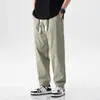 Pantalones de hombre color blanco roto, corte recto holgado, modernos y versátiles, pantalones casuales finos y transpirables para verano, ajuste cónico elástico, talla grande