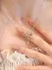 Colar de Aço Titânio Não Desbota com Pingente de Laço e Borla Gota d'Água para Mulheres Estilo Ins Nicho Luxo Acessível Simples Versátil Elegante Sensação de Alto Padrão