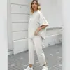 Website independente transfronteiriço: Conjunto casual feminino da Amazon com blusa de manga morcego e calça de perna larga