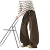 Pantalones de trabajo de retazos deconstruidos estilo americano para hombre, pantalones casuales versátiles de pierna ancha, corte limpio, corte holgado, nuevos y modernos
