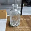 Jarrón de Cristal Repujado Vintage de Lujo de Entrada Sencilla Estilo Ins Jarrón para Mesa de Comedor Botella Decorativa Hidropónica Transparente Estilo Europeo