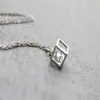 Collar con Colgante de Cubo Minimalista Transfronterizo Colgante de Circonita Colgante de Cubo Hueco Europeo y Americano