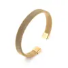 Nuevo brazalete elástico de acero de titanio de moda brazalete de malla en forma de C de acero inoxidable punto de fábrica estilo pareja mano abierta