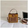 Bolso bandolera retro de nicho estilo coreano para el trabajo y los desplazamientos, que ofrece un ambiente relajado, nueva colección otoño 2026, bolso tipo cubo de alta calidad y moderno