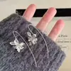 Aretes Blancos Flor K para Mujer, Versátiles para el Trabajo, Brazaletes de Oreja de Alta Gama, Nuevo Diseño de Nicho de Moda 2025, Aretes Estilo Hong Kong