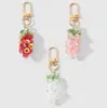 Nuevo Ins Dulce y Exquisito de Alta Apariencia Hermanas Cristal Imitación Perlas Fresa Uva Llavero DIY Colgante de Bolso