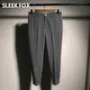 Pantalones cortos ajustados de pierna recta de cintura media transpirables elegantes de color liso holgados de estilo universitario nuevos de estilo japonés para verano