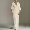 Moda femenina transfronteriza europea y americana nueva de 2026, elegante vestido de color liso con cuello en V, manga murciélago y cintura ceñida