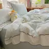 Juego de ropa de cama de cuatro piezas de algodón lavado con encaje color crema estilo japonés para niñas, funda de edredón estilo coreano, sábana bajera y funda de edredón, juego de tres piezas para dormitorio