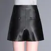 Pantalones falda de cuero para mujer 2026 otoño e invierno PU falda pantalón corta ajustada falda pantalón de cuero de dos piezas falsas pantalones de bota rectos cintura alta adelgazante