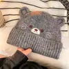 Bonito gorro de orejeras de dibujos animados, cálido y a prueba de viento de lana tejida para otoño e invierno, nuevo estilo versátil, adecuado tanto para hombres como para mujeres