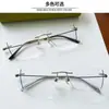 Armazones de anteojos sin marco de titanio puro ultraligeros anti-luz azul unisex de alta gama para negocios de moda de Danyang, se pueden equipar con lentes recetados