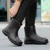 Botas de lluvia de estilo coreano hasta la mitad de la pantorrilla, negras, con suelas acanaladas antideslizantes, adecuadas para jinetes, a prueba de viento y para pescar.; botas de agua sin cordones