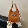 Bolso de Cubo Casual Simple Estilo Coreano para Mujer 2025 Invierno Nuevo Estilo Bolso de Hombro Cruzado Elegante de Alta Calidad