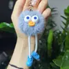En Stock Entrega Rápida Peluche Pato Bola de Carbón Patas Largas Llavero Colgante Regalo Pequeño Vendedor Ambulante Caja Sorpresa Colgante de Regalo Mayoreo