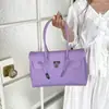 Bolsa de Gelatina de Mano Bolso Tote Platino para Mujer 2026 Nuevo Estilo de Verano PVC Color Sólido Gran Capacidad Bolso de Hombro Versátil