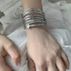 Pulsera de Estrella Multicapa Explosiones Europeas y Americanas Combinación Versátil Nicho para Dama Sentido de Alta Gama Joyería para Mano Absorción Magnética Diseño Personalizado de Moda
