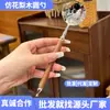 Cuchara Redonda de Imitación de Palosanto de Moda Cuchara de Acero Inoxidable Mango Largo Cabeza Redonda Cuchara de Postre para el Hogar Mango de Plástico de Alto Valor