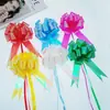 Nuevo mediano transfronterizo bola tridimensional flor de tirar a mano embalaje de regalo de Navidad película aluminizada flor de tirar 3 * 120cm