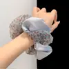 Goma de pelo de malla satinada azul con estampado de leopardo estilo retro perezoso con un moño elegante y accesorio para el cabello extragrande