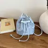Bolsa de Ombro Única Tendência Estilo Nacional Primavera/Verão 2026 Nova Bolsa de Mão Versátil Feminina Bolsa Saco Elegante com Laço de Moda