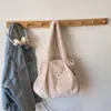 Elegante e moderna, macia e versátil, simples e elegante, bolsa de ombro casual, bolsa de mão de pelúcia feminina para o outono de 2026