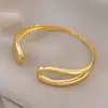 Pulseira Aberta Geométrica de Gota d'Água Transpassada Europeia e Americana Pulseira Simples de Personalidade Fashion Joias de Luxo Leve de Alta Qualidade para Mulheres