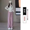 Pantalones de mujer de pierna ancha, holgados, a la moda y casuales, de cintura alta, con finas rayas, bolsillos y un diseño de pierna recta y fluido, hechos de terciopelo de algodón, para otoño e invierno 2026