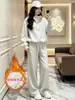 Moda estilo francés 2026 deportivo nuevo otoño e invierno casual moderno reductor de edad conjunto de dos piezas con sudadera con capucha y pantalones de pierna ancha