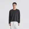 También, la camiseta de manga larga texturizada de Henry para hombre, una prenda interior holgada y versátil de punto gofrado para otoño