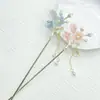 Horquilla de Perla y Flor para Mujer Nueva de Gama Alta Estilo Chino Antiguo Tocado con Borla Joyería de Pasos Oscilantes