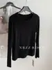 Camiseta de manga larga con cuello redondo, estilo minimalista, para mujer, otoño 2026, básica, corte holgado, adelgazante, versátil, disponible en varios colores