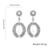 Pendientes de plata de aguja transfronterizos europeos y americanos con diamantes y perlas en diseño de lágrima, estilo exagerado y único, lujo ligero y sensación de alta gama