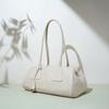 2026 Diseño de Nicho Minimalista Francés Bolso Triangular Nuevo de Cuero Genuino Bolso de Mano de Moda Bolso de Hombro para Viajes Diarios para Mujer