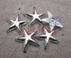 Hebilla de estrella de cinco puntas tridimensional multicolor Accesorios para regalos de Navidad Botón de plástico DIY Agujero cóncavo de 1.8 cm