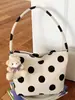 Bolso de mujer de moda de lunares de nicho estilo coreano 2026 nuevo bolso de hombro para el verano bolso de cubo pequeño elegante