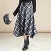 Elegante falda de cuadros para mujer, nuevo estilo otoño e invierno 2026, de cintura alta, falda de línea A adelgazante, falda versátil de dobladillo grande irregular