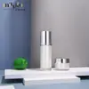 Botella de loción blanca perlada de 80 ml, frasco de crema de 30 g, botella cosmética acrílica redonda recta con hombros, botella de punto