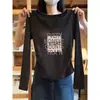 Camiseta de manga larga con cuello en V de algodón puro para mujer, nueva colección de otoño 2026, corte de hombro regular, estiliza, elegante y perfecta como capa interior o top básico.