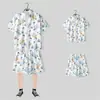 Camisa floral de manga corta, Ropa de playa de Hainan, Estilo hawaiano de Sanya, Conjunto de pantalones cortos finos de verano para hombre y pareja de viaje a Tailandia