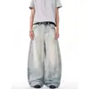 Moda transfronteriza estilo Hong Kong moderno para hombre y mujer verano nuevo 2026 jeans rotos personalizados hip-hop tendencia ins calle alta