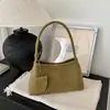 Bolso de hombro tejido versátil de moda retro estilo coreano 2026, un bolso de hombro de alta gama y único que se puede llevar cruzado.