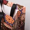 Bolsa de mano sin base con estampado Paisley y logo personalizado, bolsa de papel para tiendas de ropa, bolsa de regalo, bolsa de embalaje para compras al por mayor