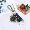 Nuevo colgante de aleación despertador retro llavero de piel de vaca joyería para hombre llavero de coche suministro de comercio electrónico transfronterizo