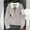Suéter de punto con cuello polo y bordado de cachorro para mujer con corbata de lazo, suéter base de punto trenzado ajustado de otoño para mujer