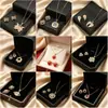 Conjunto de pendientes y collar Xuping estilo vintage de nicho europeo y americano transfronterizo, conjunto de joyería elegante de aleación de cobre, venta al por mayor y hecho a medida