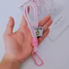 Muñeca de Cuerda Trenzada Llavero de Cuerda de Felpa Cadena Doble para Teléfono Móvil Mosquetón de Nailon Accesorios Colgantes Hechos a Mano para Teléfono Móvil